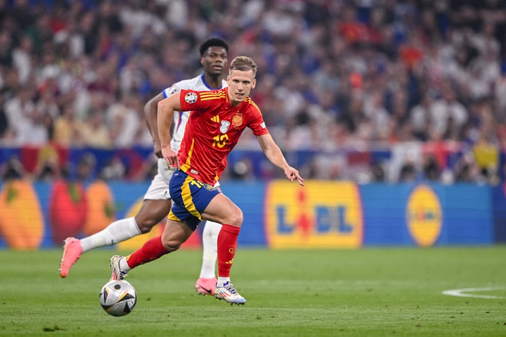 Aurélien Tchouameni of France and Dani Olmo of Spain battle for the ball during the UEFA EURO 2024 - Semi-final match between Spain and France at M...