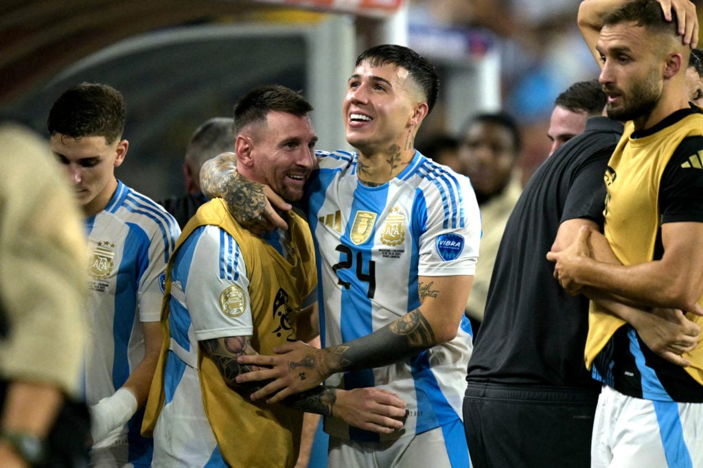 Argentina's forward #10 Lionel Messi (L) and Argentina's midfielder #24 Enzo Fernandez celebrate their team's first goal during the Conmebol 2024 C...