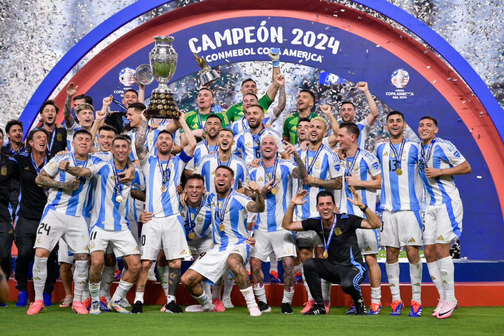 Argentina players celebrate lifting Copa America trophy