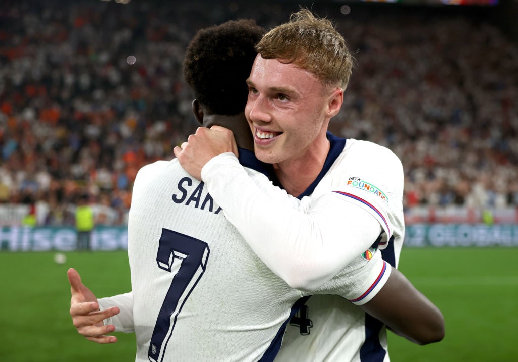 Bukayo Saka and Cole Palmer of England celebrate following the UEFA EURO 2024 semi-final match between Netherlands and England at Football Stadium ...
