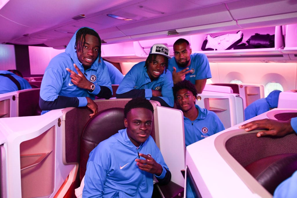 Noni Madueke, Tyrique George, Carney Chukwuemeka, Robert Sanchez and Josh-Kofi Acheampong of Chelsea during their flight to the United States of Am...