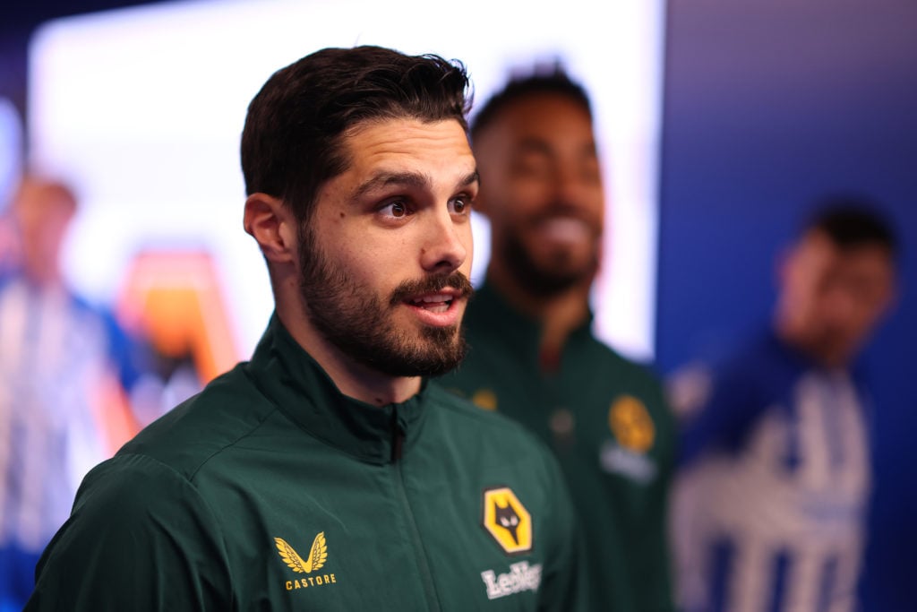 Pedro Neto of Wolverhampton Wanderers looks on inside the players tunnel prior to the Premier League match between Brighton & Hove Albion and W...