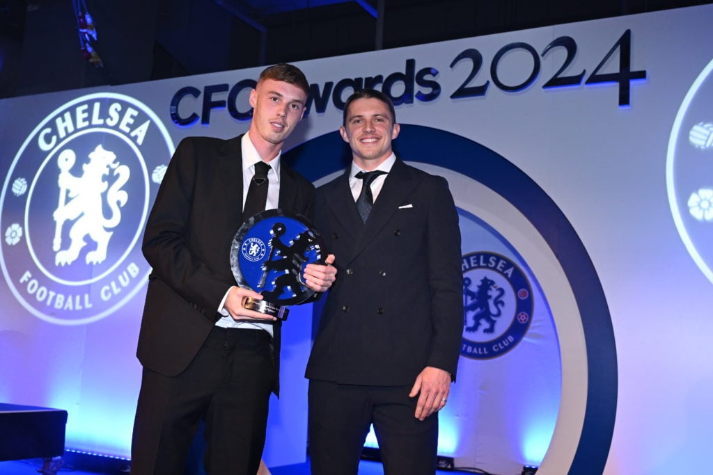 Cole Palmer of Chelsea with his award for Chelsea Players' Player of the Year, presented by Conor Gallagher during the Chelsea FC 2024 Awards night...