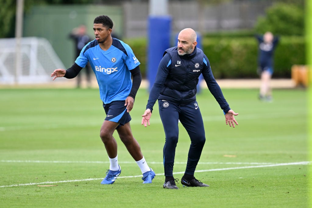 Wesley Fofana and Head Coach Enzo Maresca of Chelsea during a training session at Chelsea Training Ground on July 8, 2024 in Cobham, England.