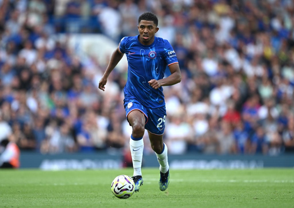 Wesley Fofana of Chelsea runs with the ball during the Premier League match between Chelsea FC and Manchester City FC at Stamford Bridge on August ...