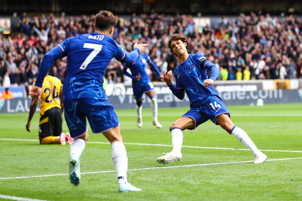 Joao Felix of Chelsea celebrates their sixth goal with Pedro Neto of Chelsea during the Premier League match between Wolverhampton Wanderers FC and...