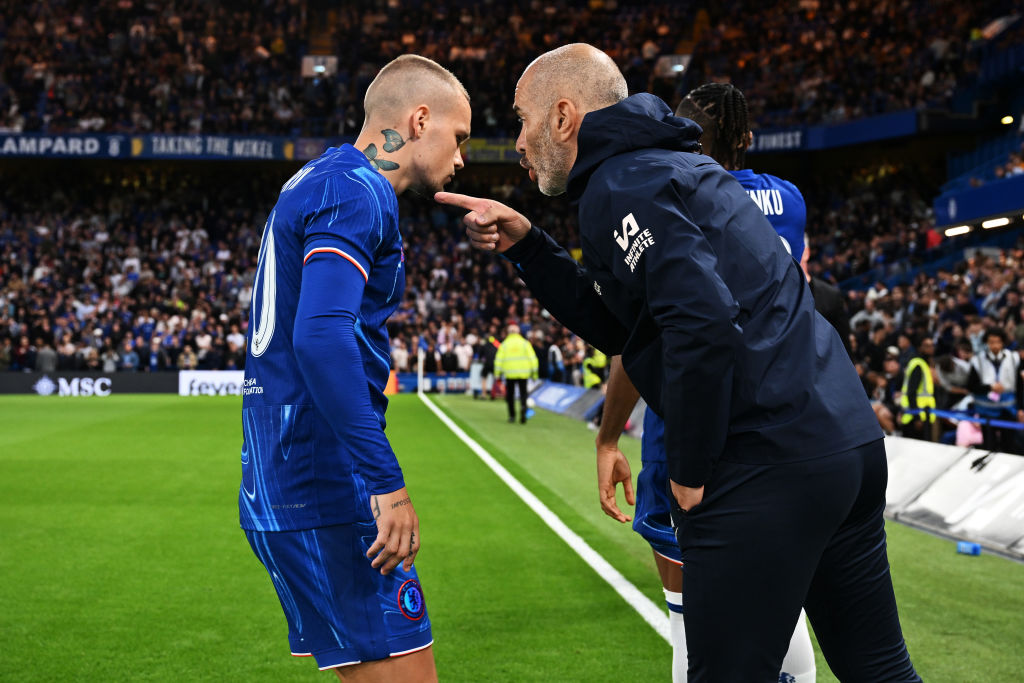 Enzo Maresca, Manager of Chelsea, interacts with Mykhailo Mudryk of Chelsea prior to the UEFA Europa Conference League Play-Off 1st leg match betwe...