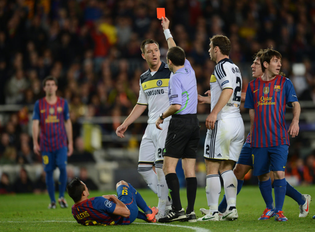 Chelsea's defender John Terry (C) receiv