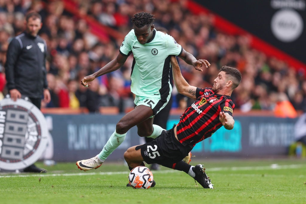 Nicolas Jackson of Chelsea avoids a tackle from Marcos Senesi of Bournemouth during the Premier League match between AFC Bournemouth and Chelsea FC...