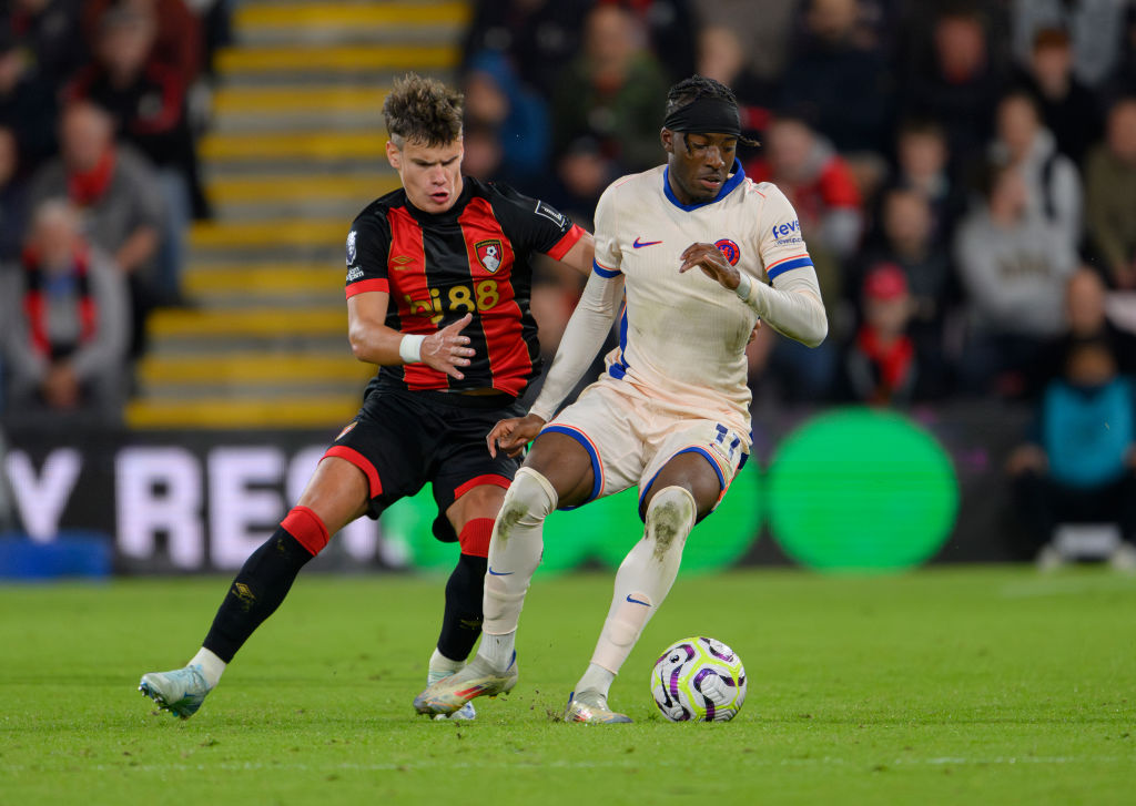 Chelsea's Noni Madueke (left) under pressure from Bournemouth's Milos Kerkez (right) during the Premier League match between AFC Bournemouth and Ch...