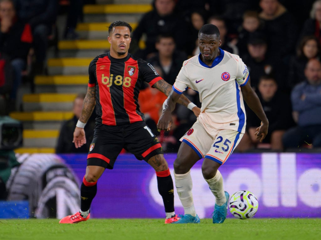 Chelsea's Moises Caicedo (left) holds off the challenge from Bournemouth's Justin Kluivert (left) during the Premier League match between AFC Bourn...