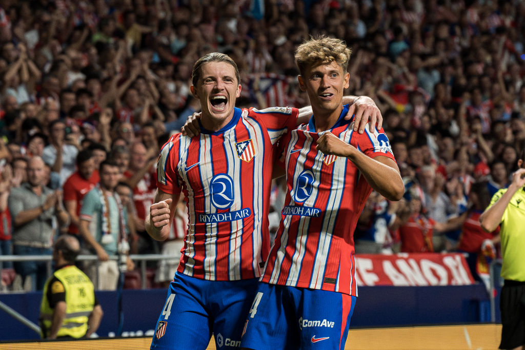 Conor Gallagher (4) and Marcos Llorente (14) seen during the