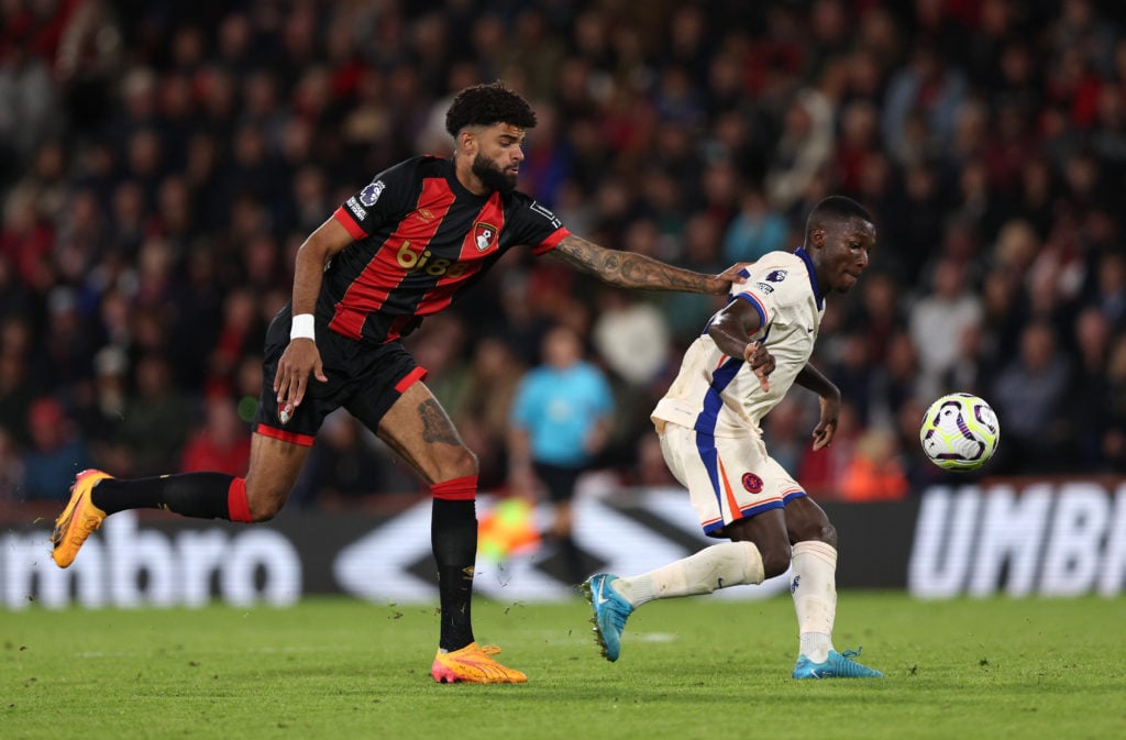 Moises Caicedo of Chelsea controls the ball under pressure from Philip Billing of AFC Bournemouth during the Premier League match between AFC Bourn...