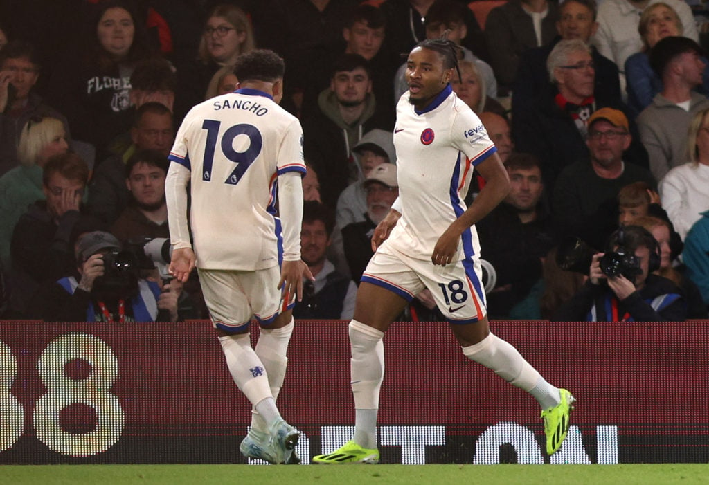 Christopher Nkunku and Jadon Sancho celebrate Chelsea's winner against Bournemouth.