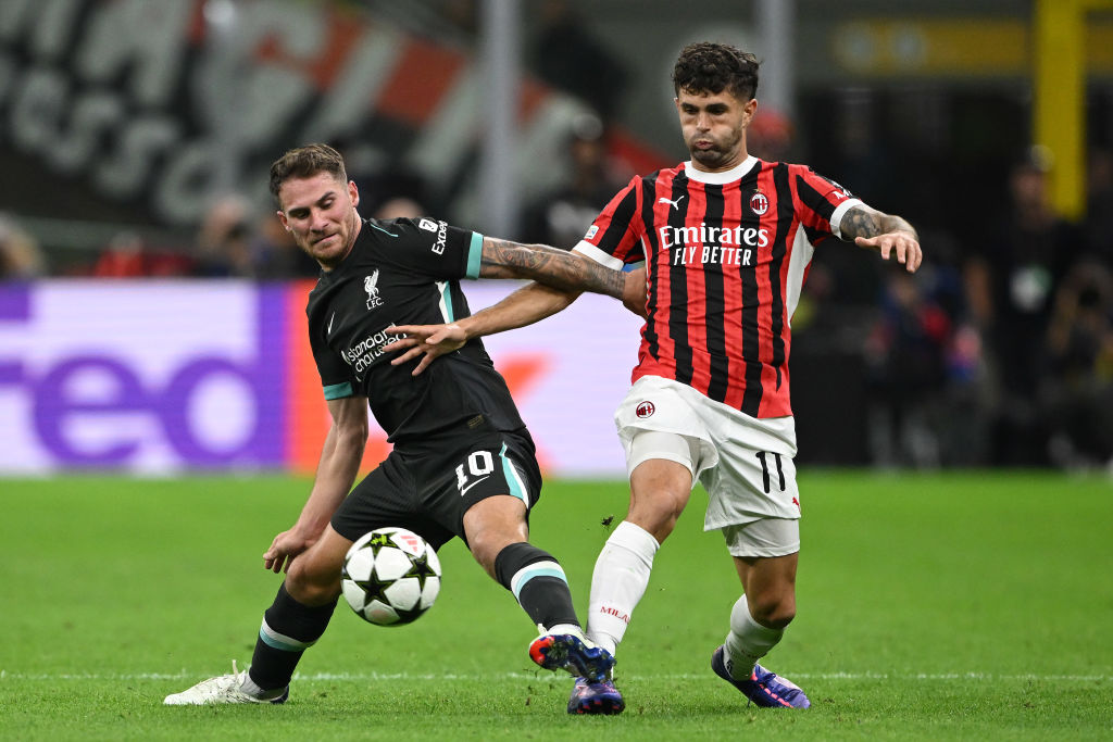 Alexis Mac Allister of Liverpool FC competes for the ball with Christian Pulisic of AC Milan during the UEFA Champions League 2024/25 League Phase ...