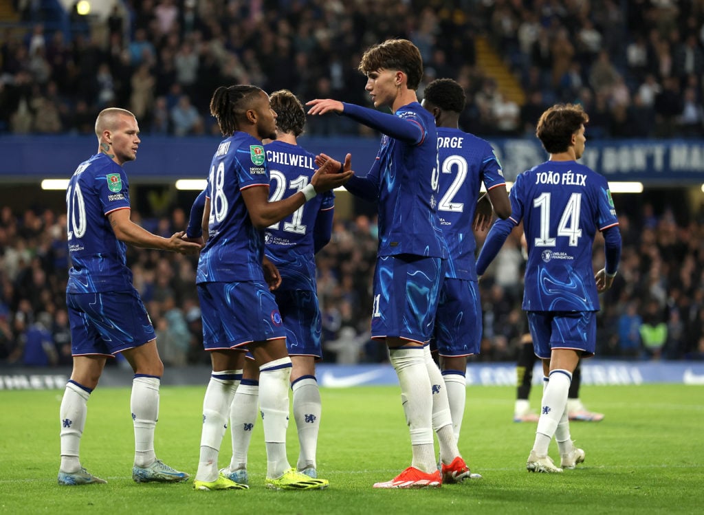 Christopher Nkunku of Chelsea celebrates scoring his team's fifth goal, and completing his hattrick with teammate Cesare Casadei during the Carabao...