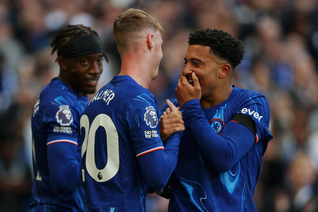 Cole Palmer of Chelsea celebrates scoring his team's second goal from the penalty spot with team mate Jadon Sancho during the Premier League match ...