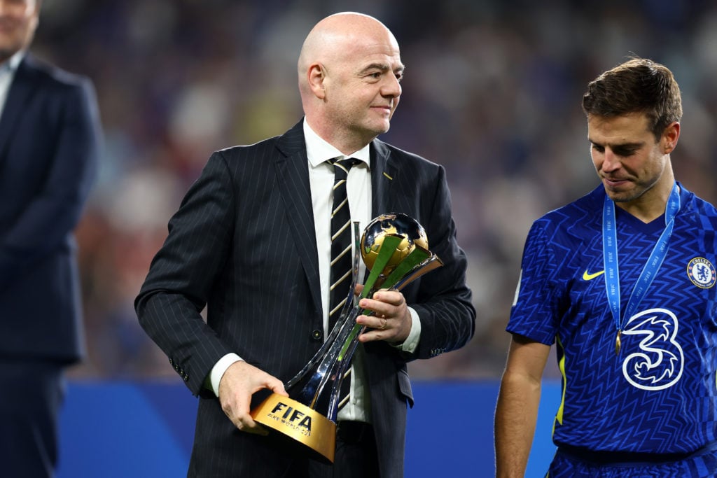FIFA President, Gianni Infantino hands over the FIFA Club World Cup trophy to Cesar Azpilicueta of Chelsea following the FIFA Club World Cup UAE 20...