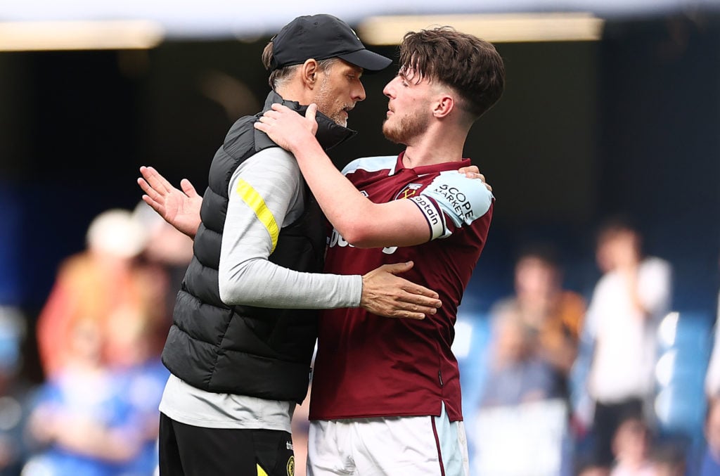 Thomas Tuchel, Manager of Chelsea embraces Declan Rice of West Ham United after the final whistle during the Premier League match between Chelsea a...