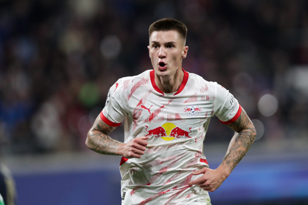 Benjamin Sesko of RB Leipzig celebrates after scoring a goal against Juventus in the Champions League.