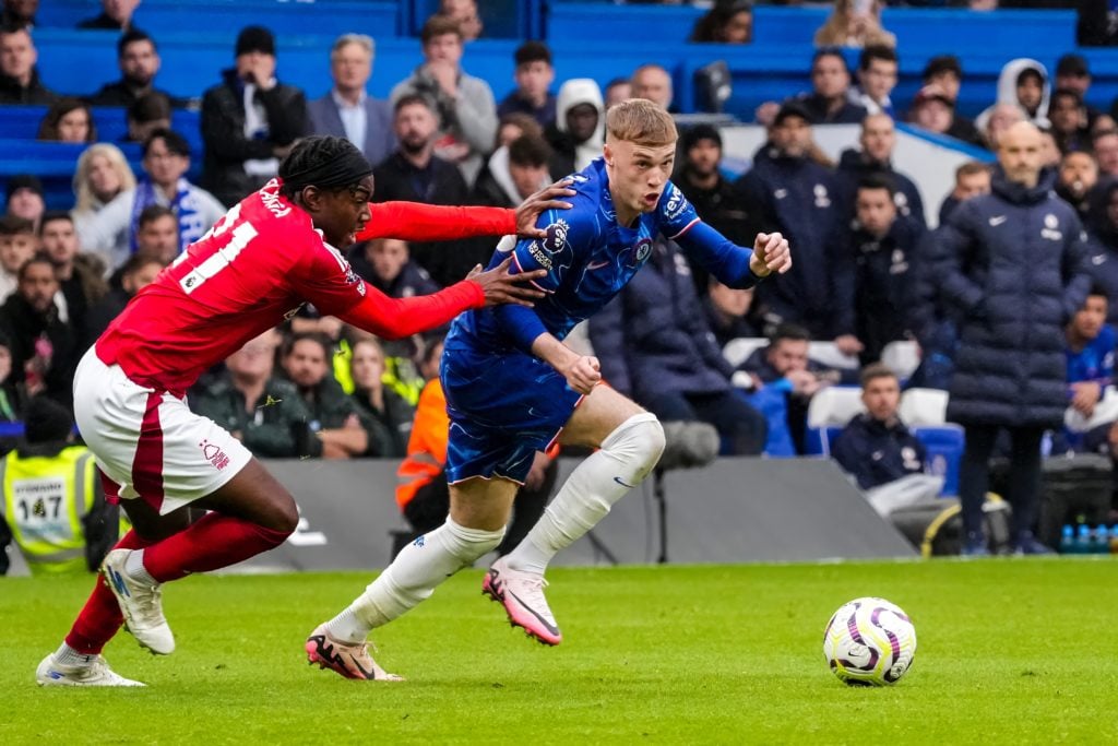 Anthony Elanga of Nottingham Forest FC challenges Cole Palmer of Chelsea FC during the Premier League match between Chelsea FC and Nottingham Fores...