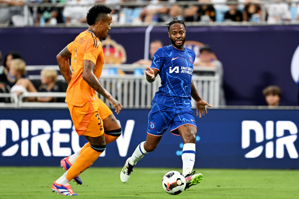 Raheem Sterling of Chelsea is challenged by Eder Militao of Real Madrid during the Pre-Season Friendly match between Real Madrid and Chelsea at Ban...