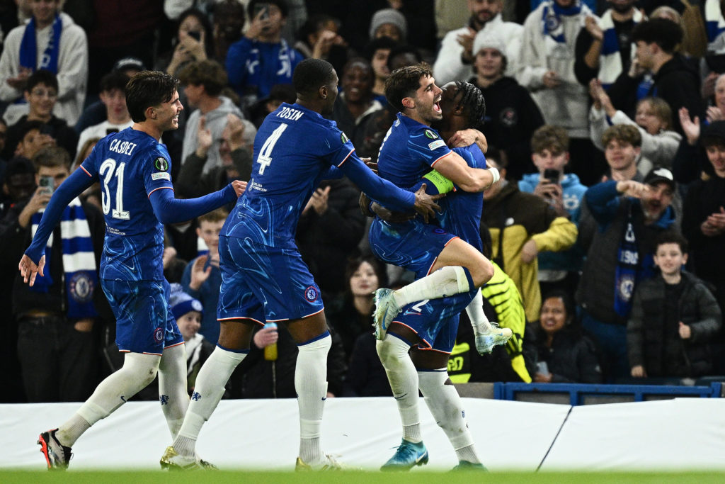 Pedro Neto of Chelsea celebrate with Axel Disasi
