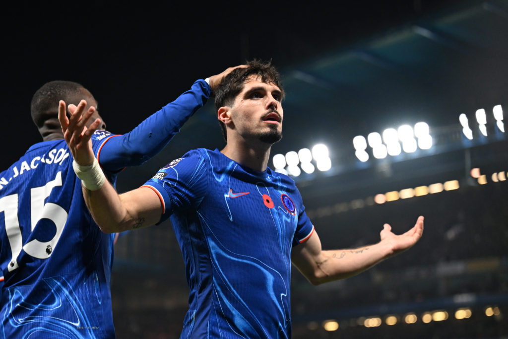 Pedro Neto of Chelsea celebrates scoring his team's first goal during the Premier League match between Chelsea FC and Arsenal FC at Stamford Bridge...