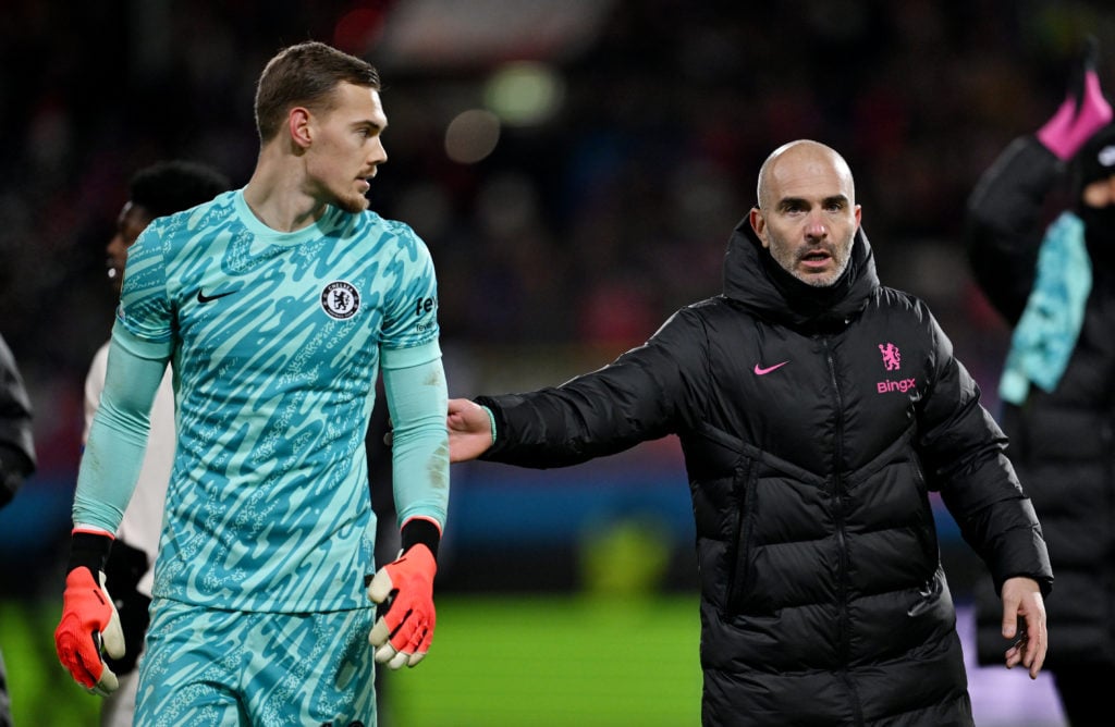 Enzo Maresca, Manager of Chelsea, interacts with Filip Jorgensen at the end of the UEFA Conference League 2024/25 League Phase MD4 match between 1....