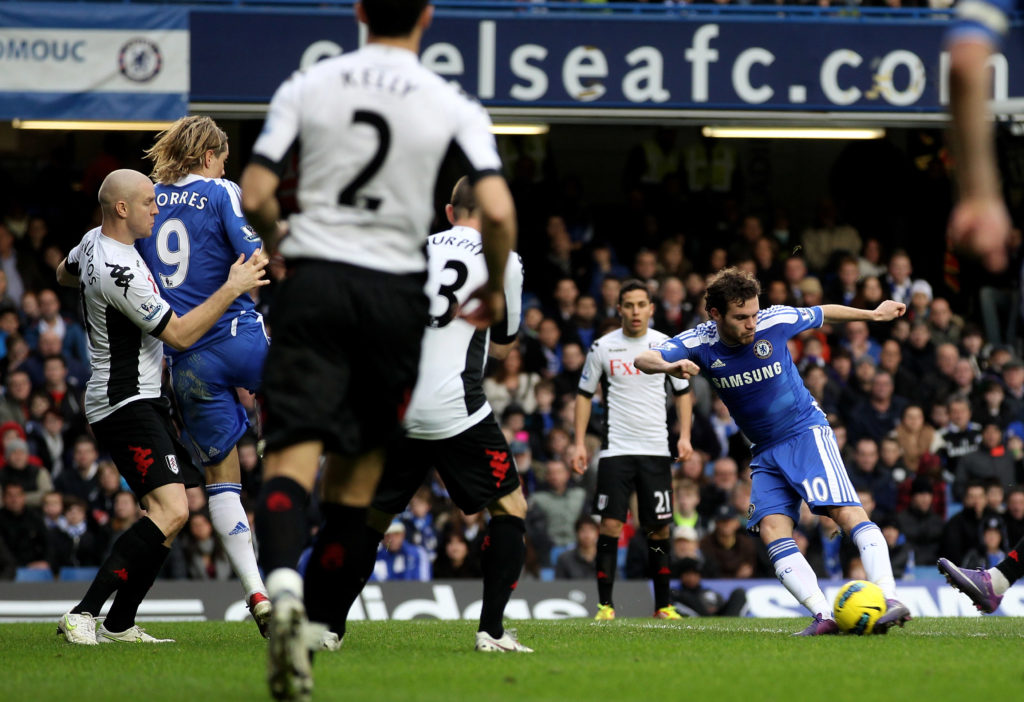 Juan Mata of Chelsea scores the opening goal during the Barclays Premier League match between Chelsea and Fulham at Stamford Bridge on December 26,...