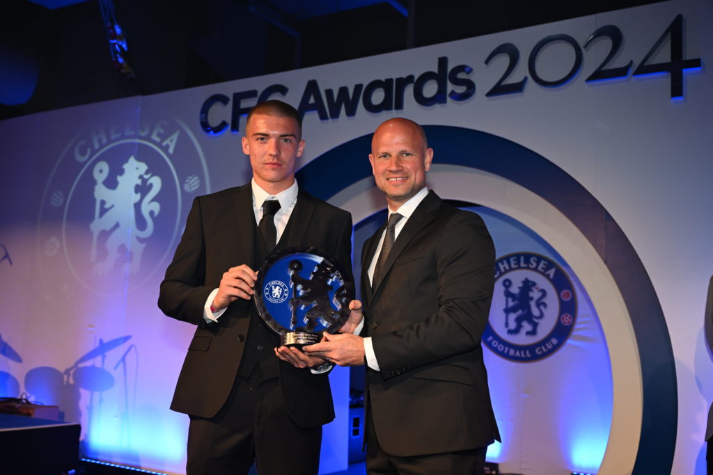 Alfie Gilchrist of Chelsea with his award for Chelsea Men's Academy Player of the Year, presented by Jim Fraser of Chelsea FC, during the Chelsea F...