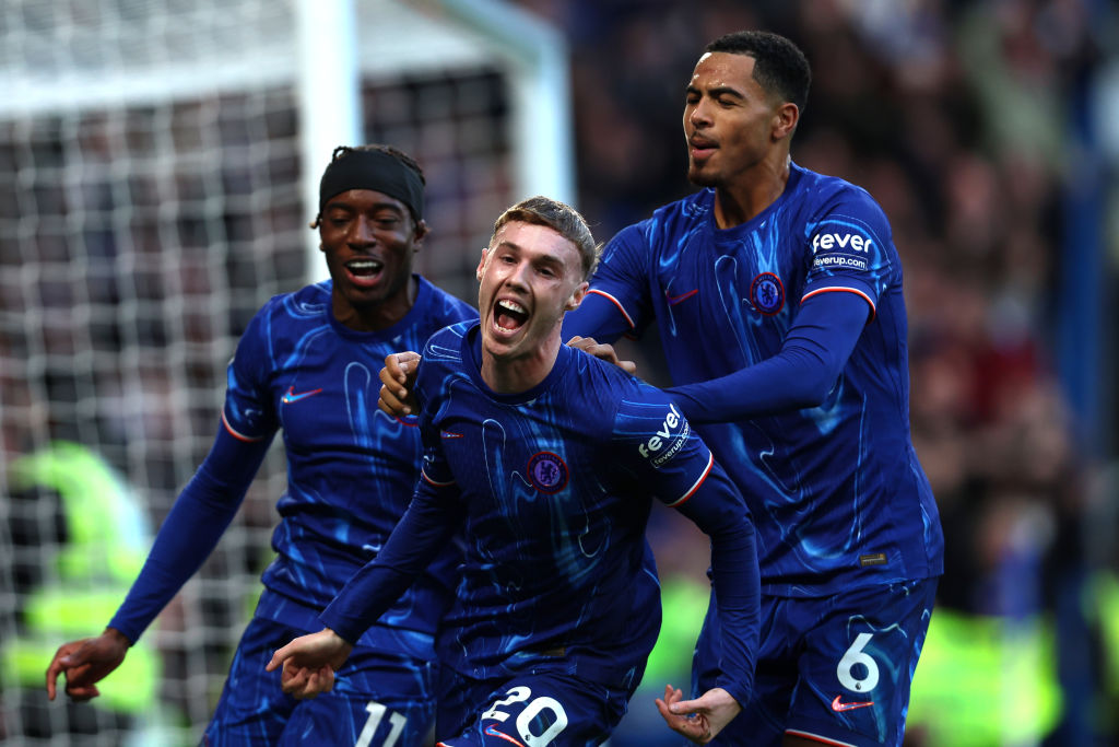 Cole Palmer of Chelsea celebrates scoring his team's third goal with Noni Madueke and Levi Colwill during the Premier League match between Chelsea ...