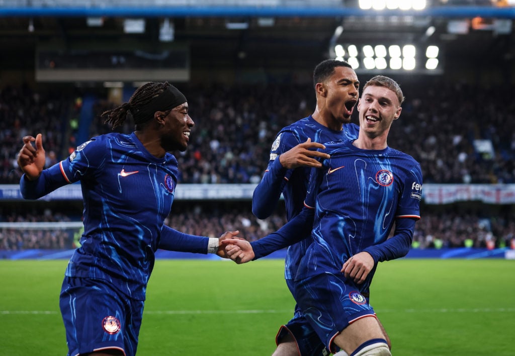 Cole Palmer of Chelsea celebrates scoring his team's third goal with Noni Madueke and Levi Colwill during the Premier League match between Chelsea ...