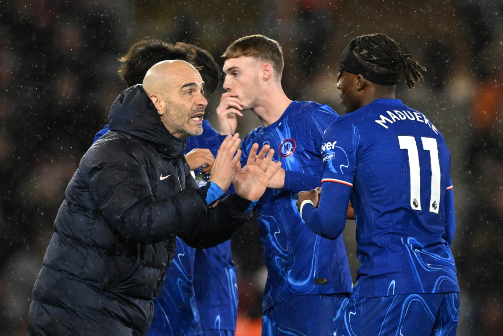 Enzo Maresca, Manager of Chelsea, speaks to Noni Madueke during the Premier League match between Southampton FC and Chelsea FC at St Mary's Stadium...