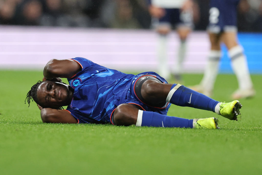 Romeo Lavia of Chelsea lies injured during the Premier League match between Tottenham Hotspur FC and Chelsea FC at Tottenham Hotspur Stadium on De...