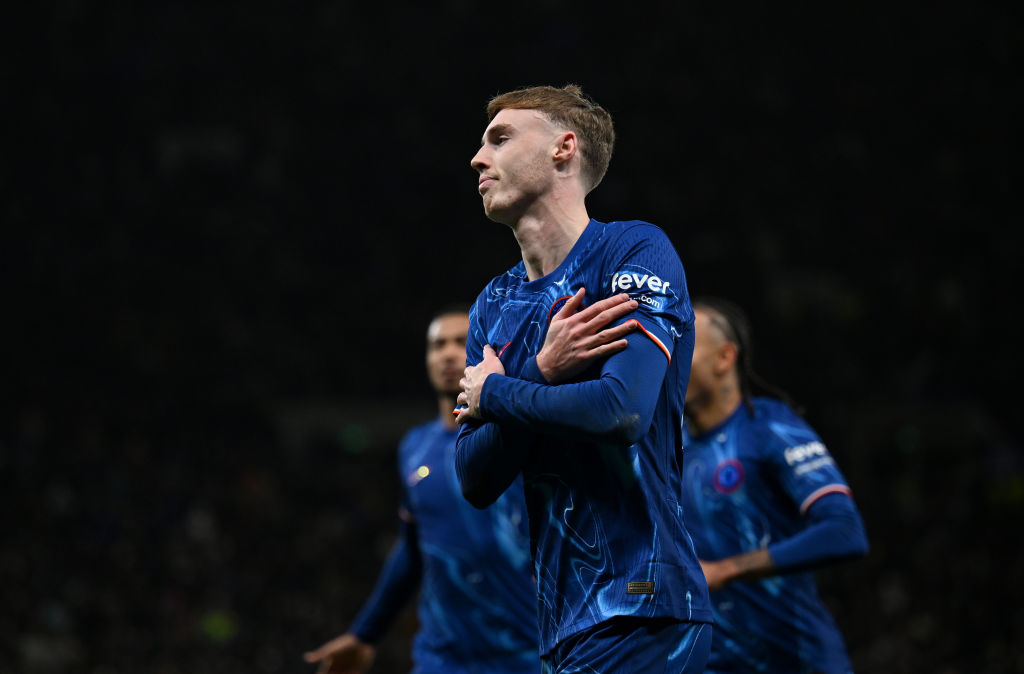 Cole Palmer of Chelsea celebrates scoring his team's fourth goal from the penalty spot during the Premier League match between Tottenham Hotspur FC...