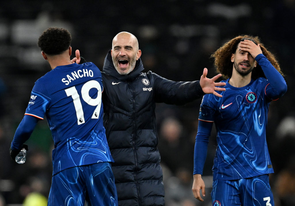 Enzo Maresca, Manager of Chelsea, celebrates with Jadon Sancho following the team's victory in the Premier League match between Tottenham Hotspur F...