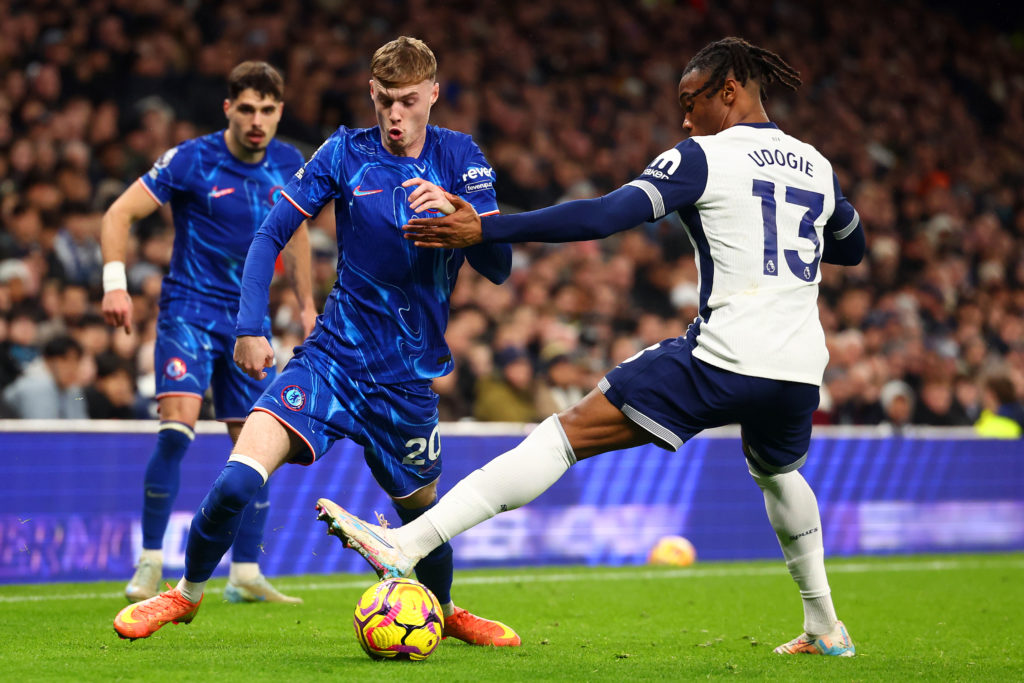 Destiny Udogie of Tottenham Hotspur in action with Cole Palmerof Chelsea during the Premier League match between Tottenham Hotspur FC and Chelsea F...