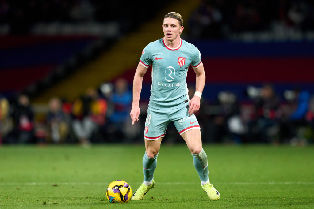 Conor Gallagher of Atletico de Madrid runs with the ball during the LaLiga EASports match between FC Barcelona and Atletico de Madrid at Estadi Oli...