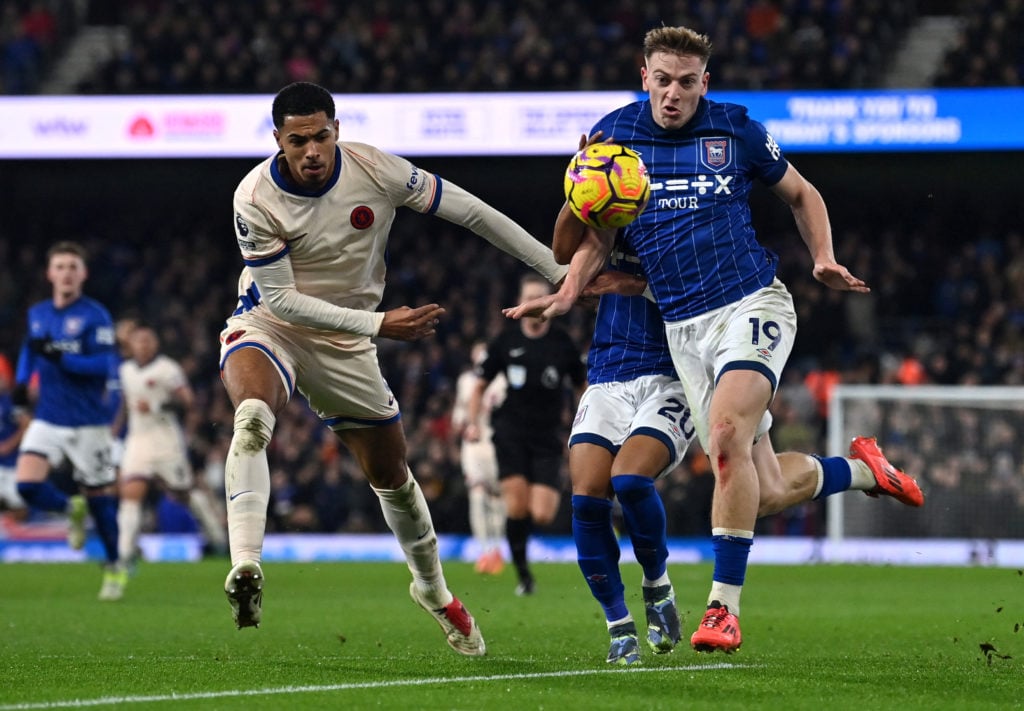 Chelsea's English defender #06 Levi Colwill battles for the ball with Ipswich Town's English midfielder #19 Liam Delap during the English Premier L...