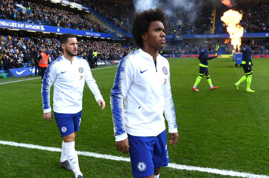 Willian and Eden Hazard walking out at Stamford Bridge for a Premier League match against Huddersfield Town.
