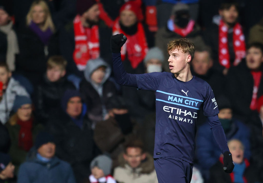 Cole Palmer of Manchester City celebrates after he scores his sides fourth goal during the Emirates FA Cup Third Round match between Swindon Town a...