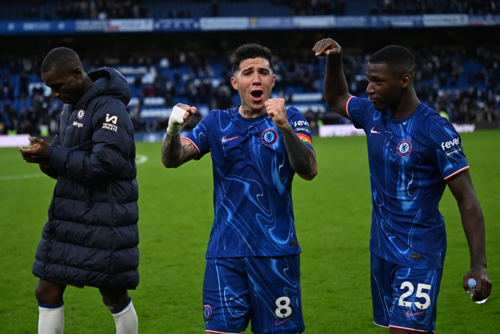 Enzo Fernandez and Moises Caicedo of Chelsea celebrate following the team's victory during the Premier League match between Chelsea FC and Aston Vi...