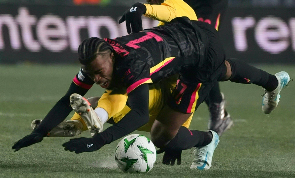 Chelsea's English midfielder #17 Carney Chukwuemeka is tackled during the UEFA Conference League football match between FC Astana and Chelsea FC in...