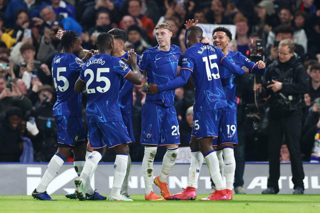 Cole Palmer of Chelsea celebrates scoring his team's first goal with teammates during the Premier League match between Chelsea FC and AFC Bournemou...