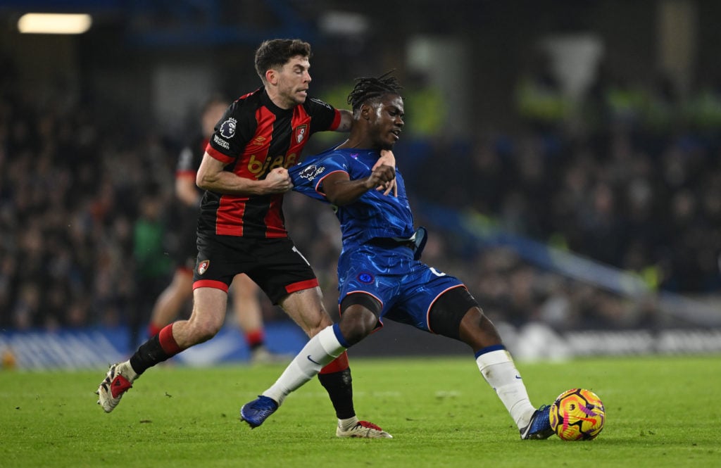 Romeo Lavia of Chelsea is challenged by Ryan Christie of AFC Bournemouth during the Premier League match between Chelsea FC and AFC Bournemouth at ...