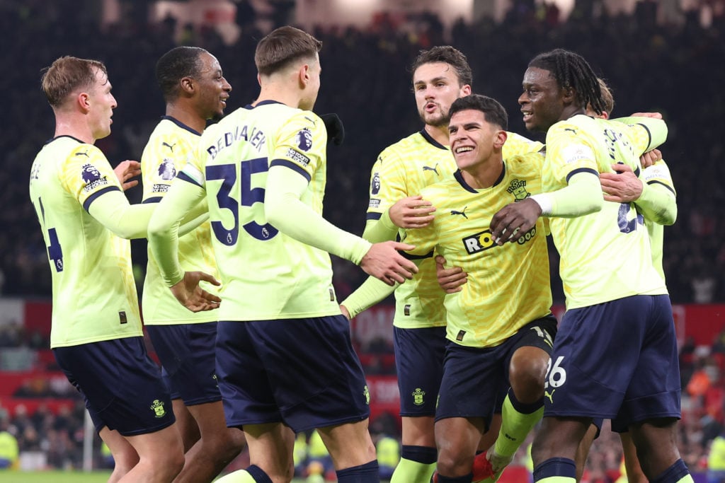 Mateus Fernandes of Southampton celebrates with teammates after Manuel Ugarte of Manchester United scores an own goal to score the visitor's first ...