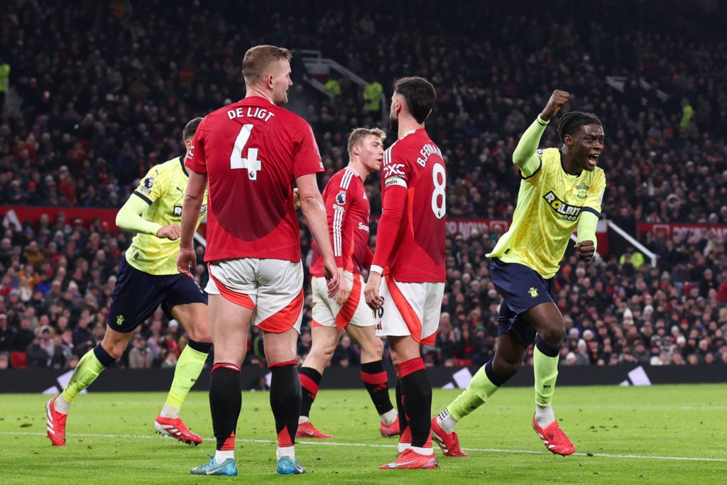 Lesley Ugochukwu of Southampton runs off to celebrate after Manuel Ugarte of Manchester United scores an own goal to score the visitor's first goal...
