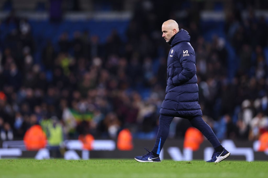 A dejected Enzo Maresca manager / head coach of Chelsea walks off at full time during the Premier League match between Manchester City FC and Chels...