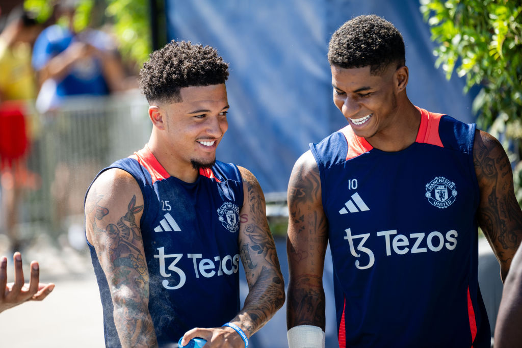 Jadon Sancho and Marcus Rashford of Manchester United arrive ahead a first team training session at UCLA Campus on August 02, 2024 in Los Angeles, ...